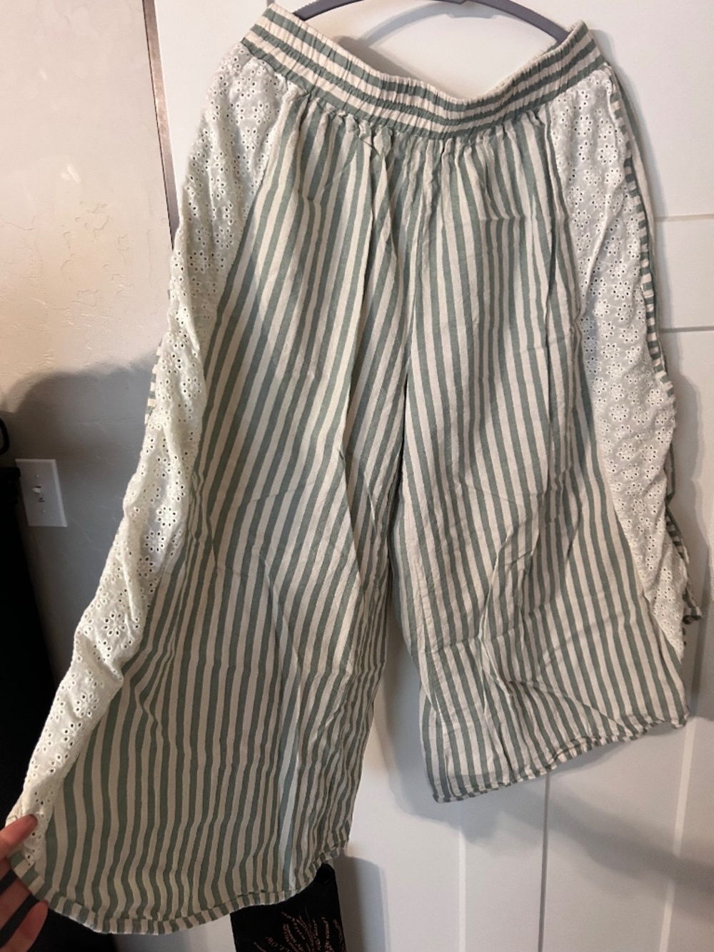 Flowy pants with eyelet detail